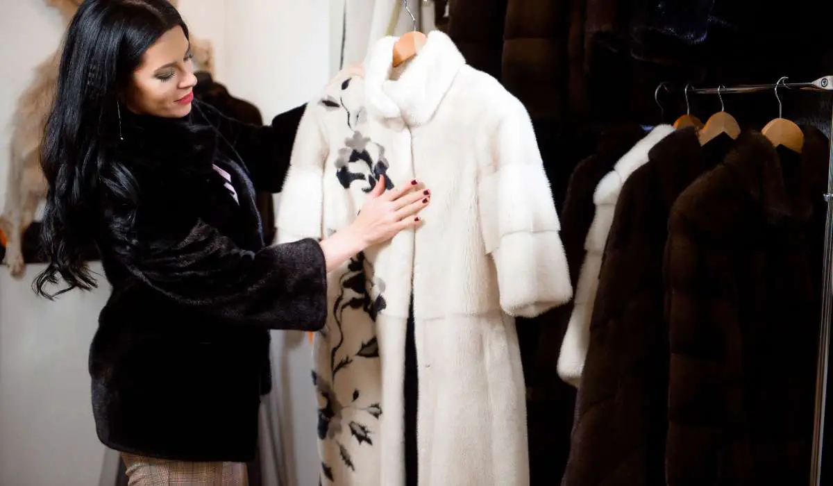 woman choosing a fur coat