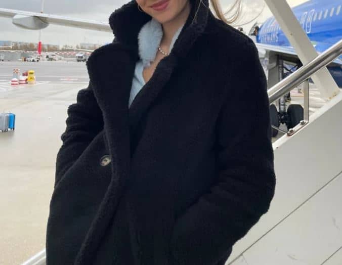 fur coat on plane