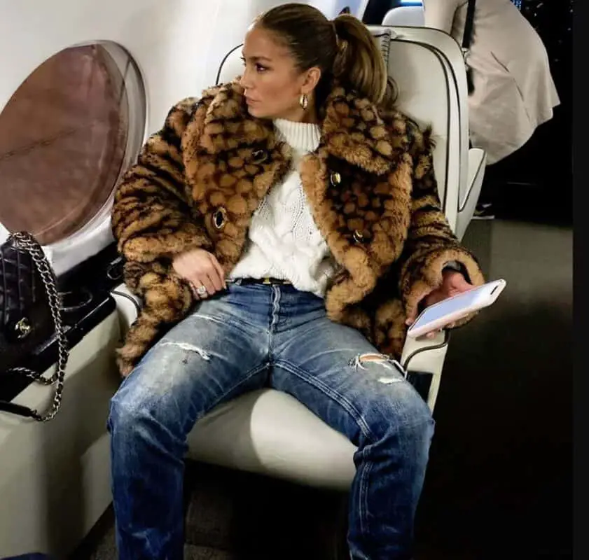 jennifer lopez fur coat in plane